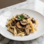 Leckere Champignon-Pasta aus der Heißluftfritteuse zubereitet.
