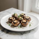 Leckere Champignons aus der Heißluftfritteuse für ein gesundes Gericht.