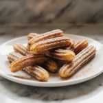 Leckere Churros in der Heißluftfritteuse zubereitet.