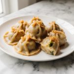 Leckere Dumplings aus der Heißluftfritteuse, perfekt für einen Snack.