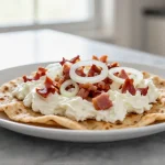 Flammkuchen mit Schmand und Speck im Airfryer – ein köstlicher Genuss