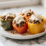 Gefüllte Paprika aus der Heißluftfritteuse - lecker und einfach zuzubereiten.