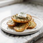 Leckere Kartoffelrösti aus der Heißluftfritteuse, knusprig und gesund zubereitet.