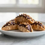Nussecken aus der Heißluftfritteuse sind die perfekte Nascherei.