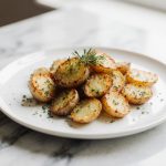 Parmesan Kartoffeln in der Heißluftfritteuse - knusprig und lecker.