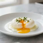 Pochierte Eier aus dem Airfryer perfekt zubereitet.