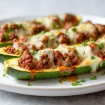 Überbackene Zucchini mit Hackfleisch, lecker zubereitet im Airfryer.