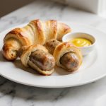 Würstchen im Schlafrock, köstlich zubereitet im Airfryer.